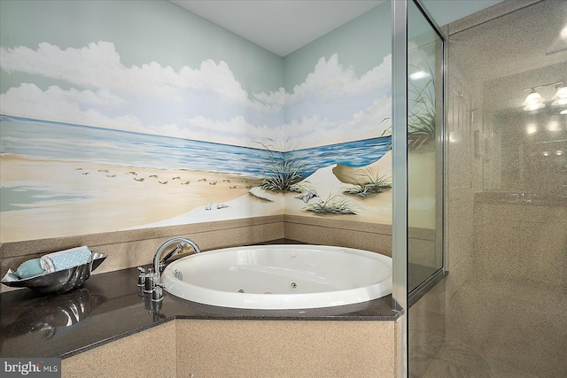 bathroom with tiled tub