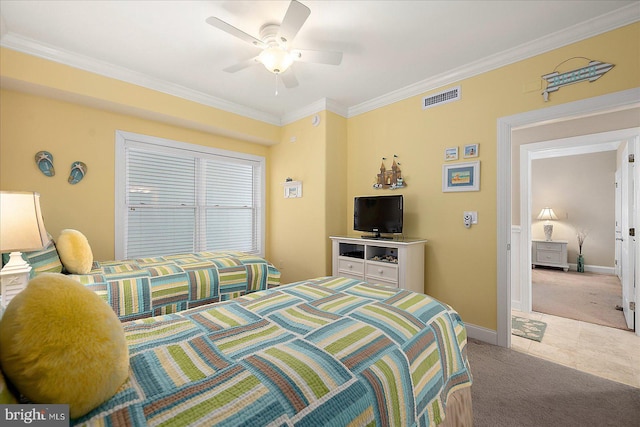 bedroom with ornamental molding, light colored carpet, and ceiling fan