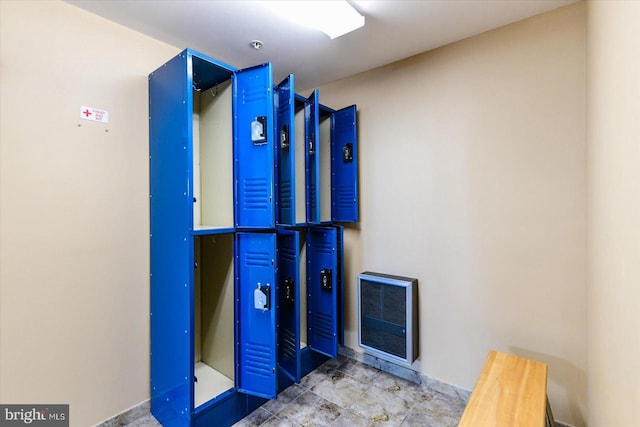 bathroom featuring heating unit