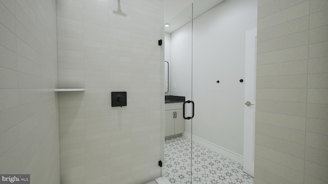 bathroom with an enclosed shower