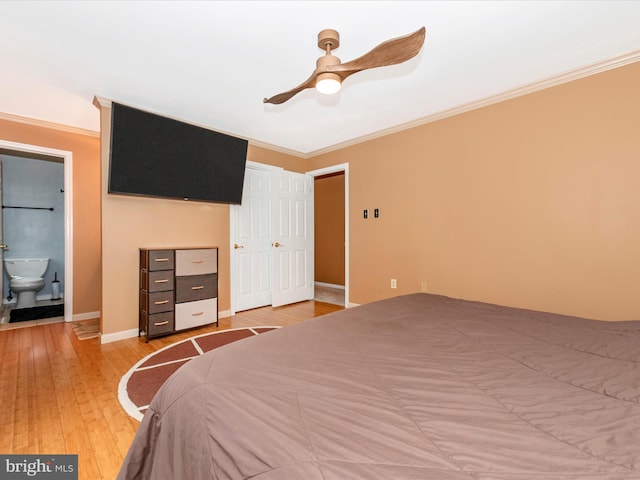 bedroom featuring crown molding, ceiling fan, and hardwood / wood-style flooring