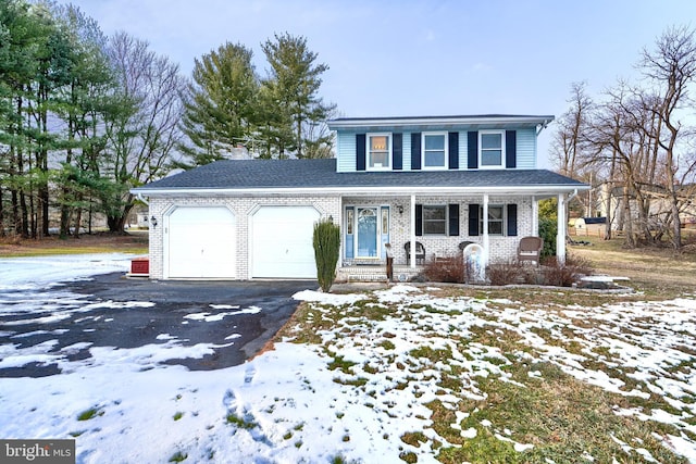 front facade with a garage