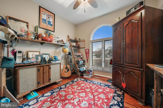 miscellaneous room with dark hardwood / wood-style floors and ceiling fan