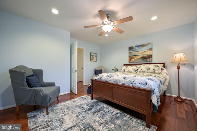 bedroom featuring dark wood-type flooring and ceiling fan