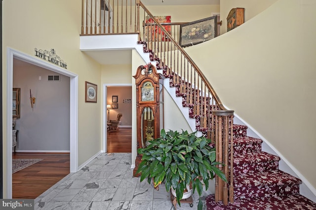 stairs with a high ceiling