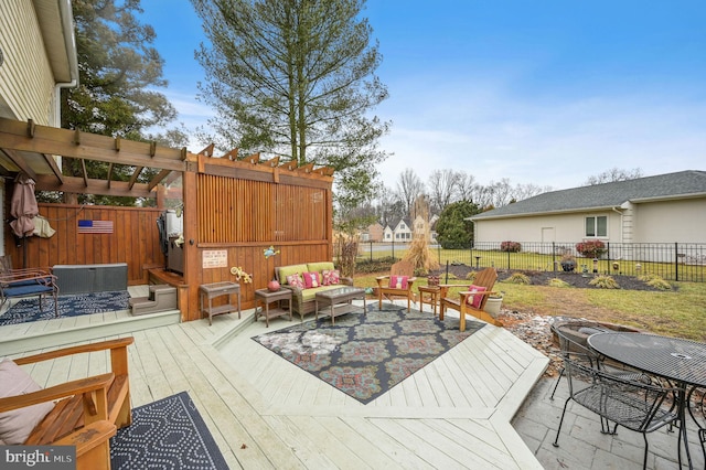 wooden terrace with an outdoor hangout area and a pergola