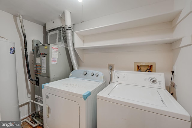 laundry area featuring separate washer and dryer and gas water heater