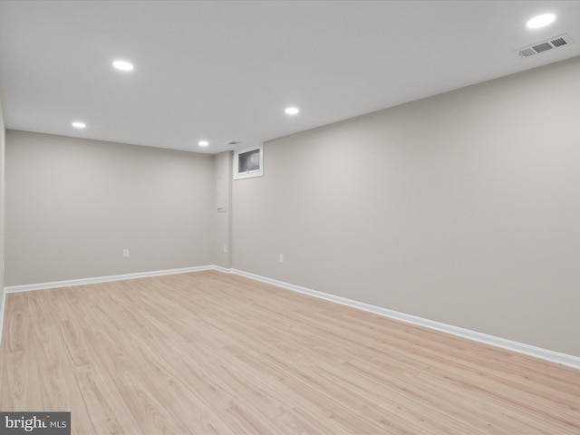 basement featuring light hardwood / wood-style flooring