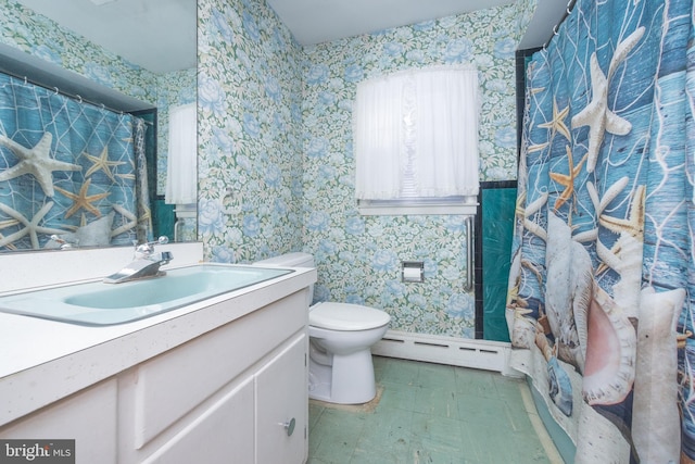 bathroom featuring vanity, a baseboard heating unit, and toilet