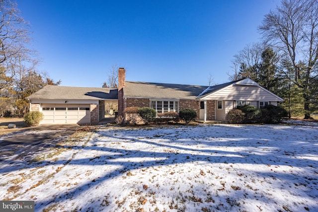 single story home featuring a garage