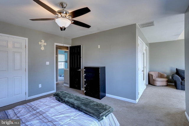 carpeted bedroom with ceiling fan