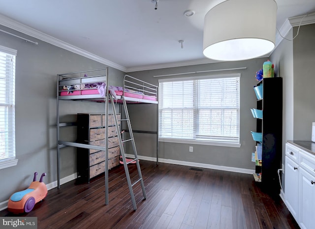 bedroom featuring multiple windows, ornamental molding, and dark hardwood / wood-style flooring