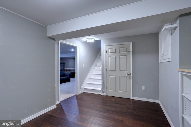 interior space with dark hardwood / wood-style flooring