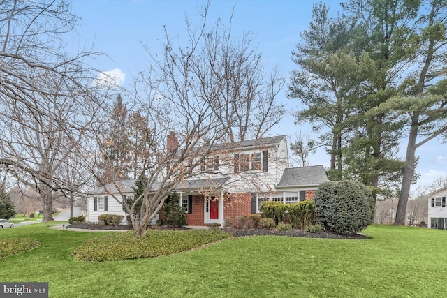 view of front facade featuring a front yard