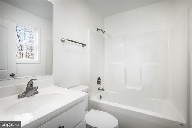 full bathroom with vanity, shower / washtub combination, and toilet