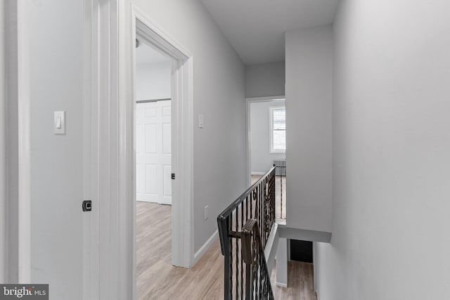 hall with light wood-type flooring