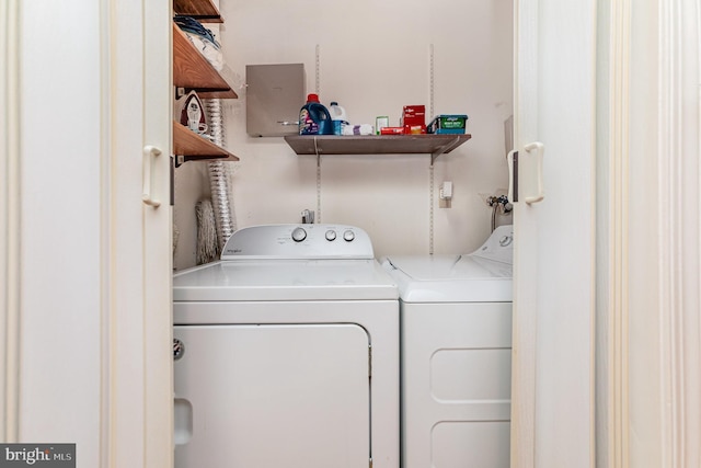 washroom featuring washer and dryer