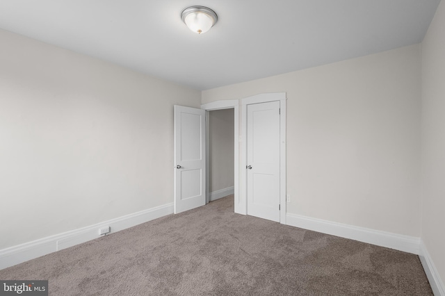 unfurnished bedroom featuring carpet floors