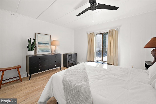 bedroom with ceiling fan and light hardwood / wood-style floors