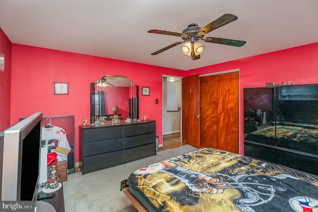 carpeted bedroom featuring ceiling fan