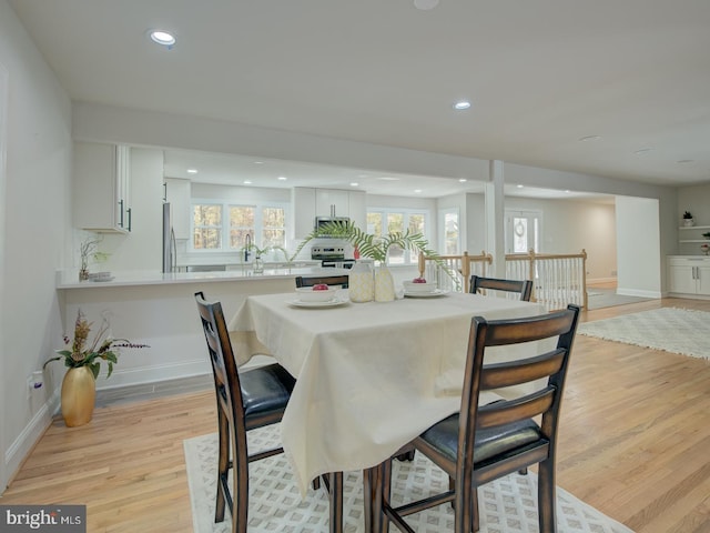 dining area featuring light hardwood / wood-style floors