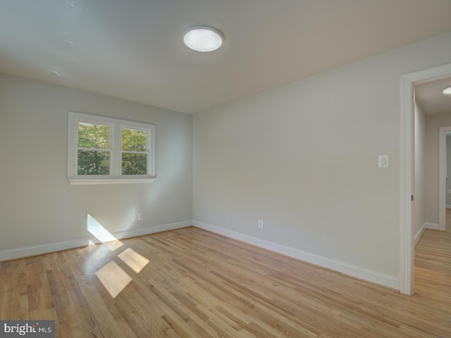 unfurnished room featuring light wood-type flooring