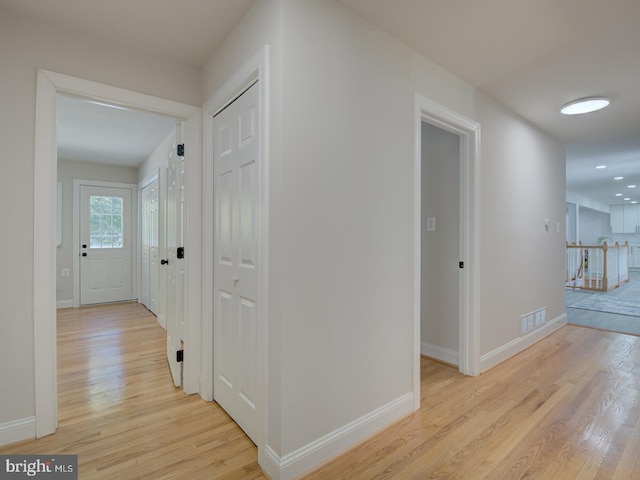 hall featuring light wood-type flooring