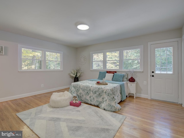 bedroom with light hardwood / wood-style floors