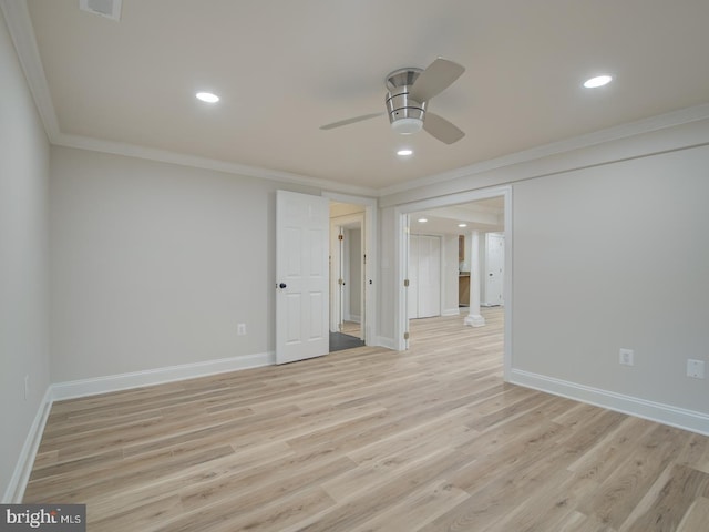 unfurnished room with ceiling fan, ornamental molding, and light hardwood / wood-style flooring