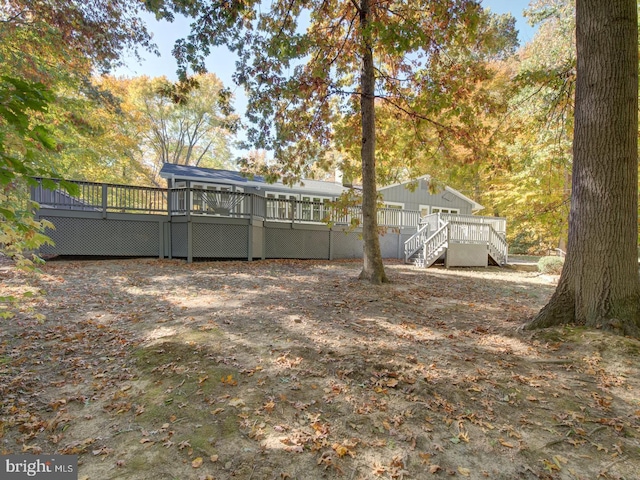 view of yard featuring a deck