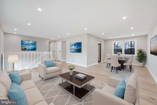 living room with light hardwood / wood-style floors