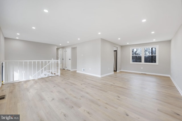 unfurnished room featuring light hardwood / wood-style flooring