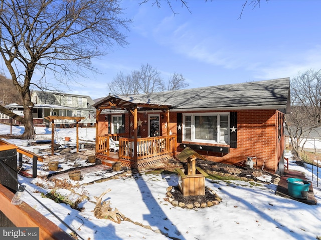 view of front of property with a deck