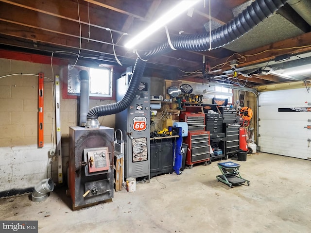 garage with a workshop area