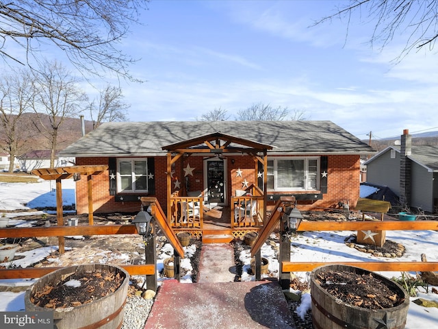 ranch-style home with covered porch