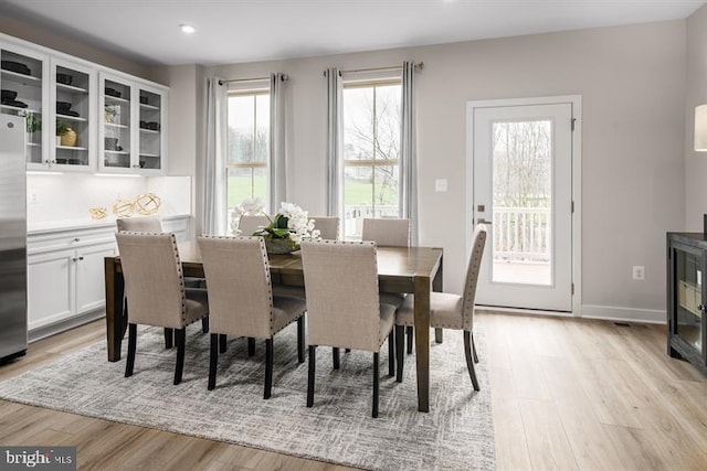 dining room featuring light hardwood / wood-style floors