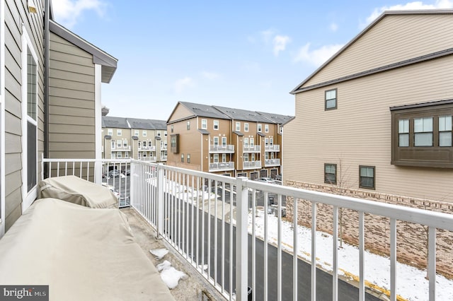 balcony featuring a residential view