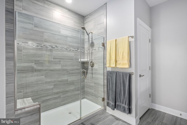 bathroom featuring an enclosed shower