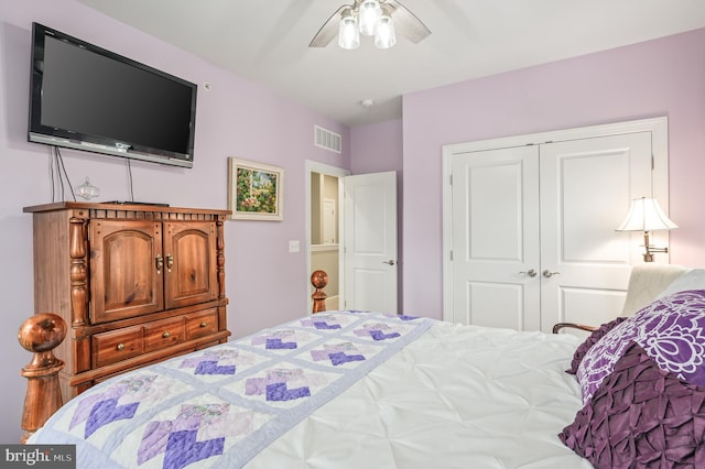 bedroom featuring a closet, visible vents, and a ceiling fan