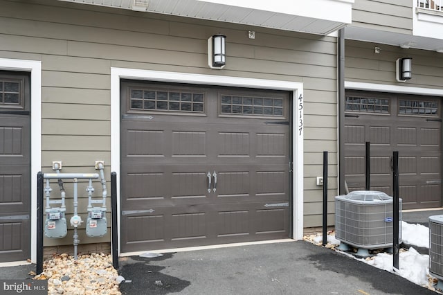 garage with central AC unit