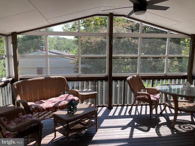 sunroom / solarium with vaulted ceiling and ceiling fan