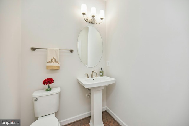 bathroom featuring sink and toilet