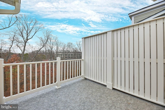 view of patio featuring a balcony