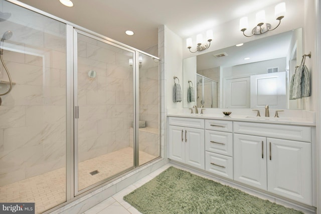 bathroom with vanity and walk in shower