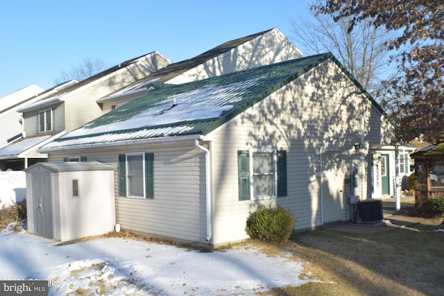 exterior space featuring central AC unit