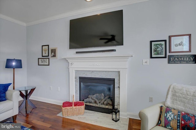 living room featuring ornamental molding and dark wood-type flooring