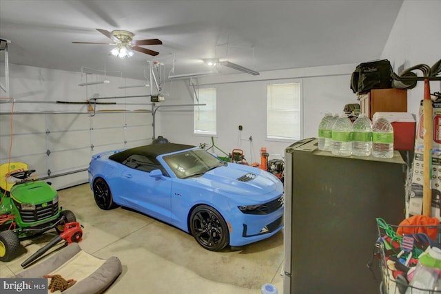 garage with stainless steel refrigerator