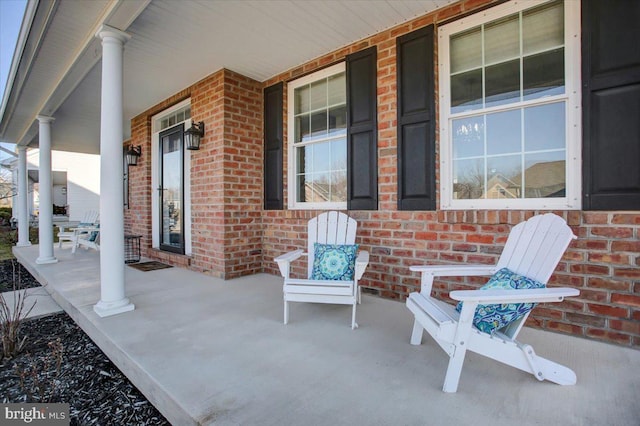 view of patio featuring a porch