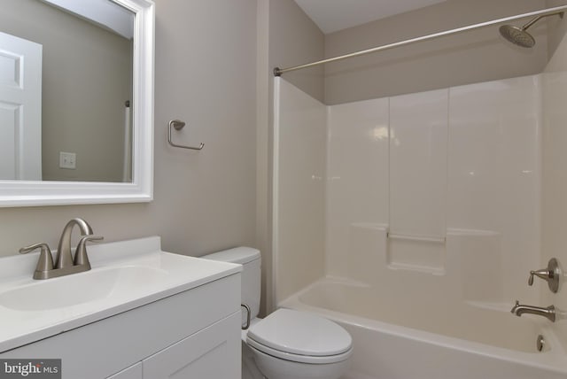 full bathroom with vanity, shower / bathtub combination, and toilet