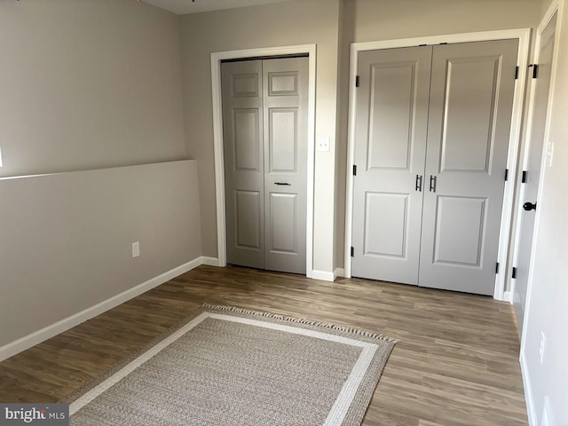 unfurnished bedroom with light hardwood / wood-style floors